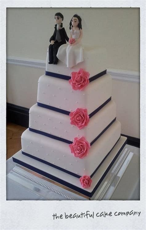 bride and groom topped wedding cake cake by cakesdecor