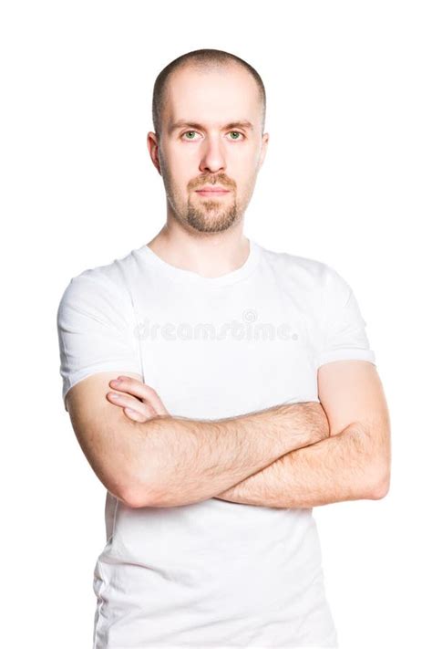 Handsome Young Man With Folded Arms In White T Shirt Stock Photo