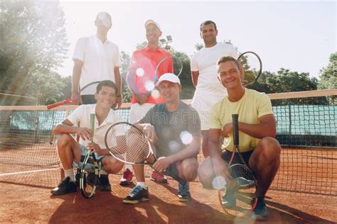 Group Of Six Male Tennis Players Standing On Court Stock Image Image