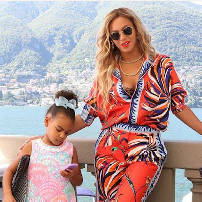 Natural hair should be applauded and my hair looks like blue ivy's right now except its moisturized and detangled, she. Beautiful new photos of Blue Ivy with her hair in a bun
