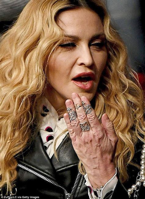 madonna s hands give away her age as she attends ufc bout in new york daily mail online