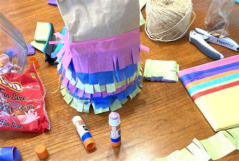 How To Make A Piñata At Home Easy Paper Bag Piñatas Mommy Poppins