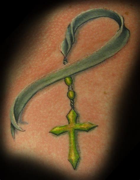 Cancer ribbons are worldwide symbol for awareness of the different deadly cancers that affect many men and women, including children, these days. Cancer Ribbon Rosary | Cancer ribbon and rosary tattoo ...