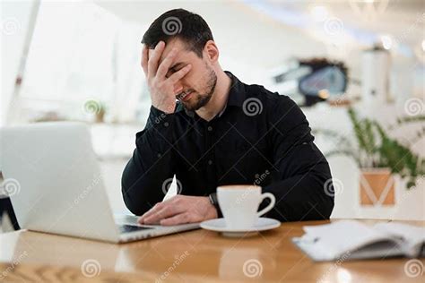 Freelancer Man Facepalming Remote Work From Coffeehouse Stock Image