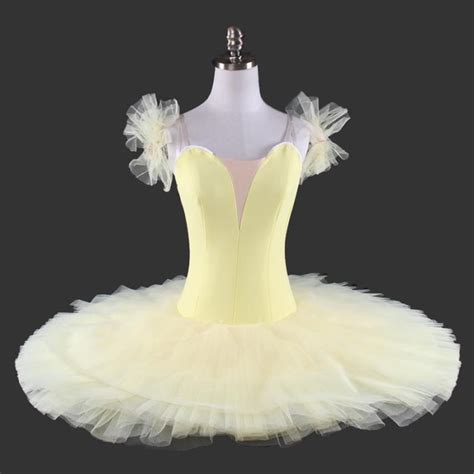 A White And Yellow Tutu Skirt On A Mannequin Headdress