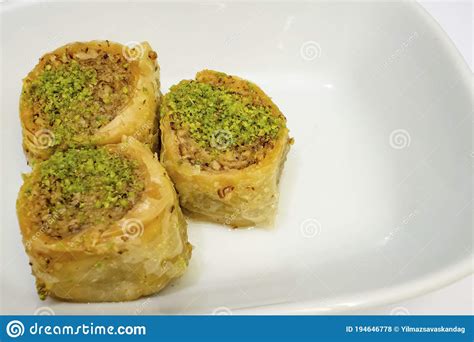 Turkish Baklava In The Form Of Rolls With Pistachio Stock Photo Image