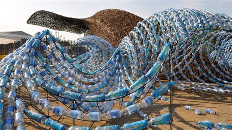 Two Life Size Whales Swim Through An Ocean Of 70000 Plastic Bottles In