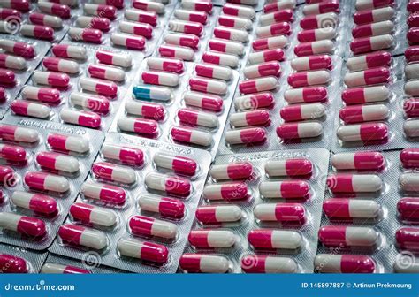 Outstanding Blue White Capsule In Many Of Pink White Antibiotic Capsule