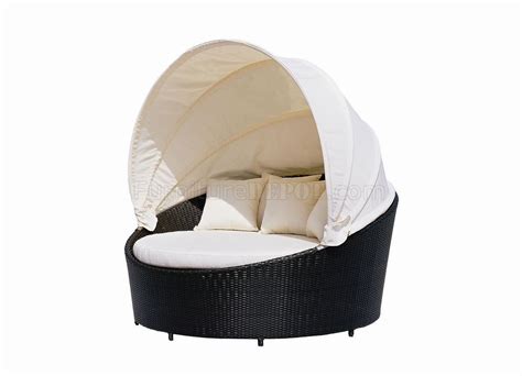 Outdoor beds with canopies and side curtains can add luxurious and inviting outdoor furniture pieces to backyard landscaping and create fabulous areas to rest and sleep in your garden. Black Modern Outdoor Canopy Bed w/Beige Cushions
