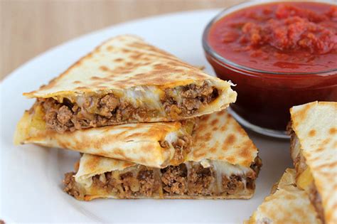 Place several slices of the meat on the bottom half of the. Beef Quesadillas Recipe | Cooking and Recipes | Before It ...