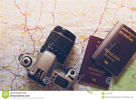 Thailand Passport And Camera On The Map For World Travel