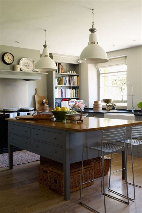 Hunter green cabinets, soft white marble and copper pots give this kitchen its quintessential english charm. Kitchen ideas | Country kitchen designs, Country kitchen ...