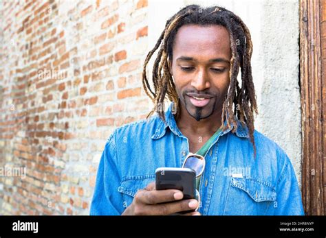 African American Young Man Using Mobile Smart Phone Hipster Guy Model