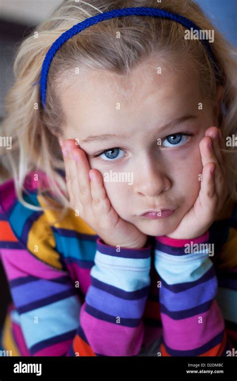 Portrait Of Child Grumpy And Pouting Stock Photo Alamy