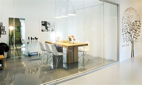 A growing trend that has revolutionized today's office design is the inclusion of glass partitions to separate workspaces. Airbnb's Beautiful Offices