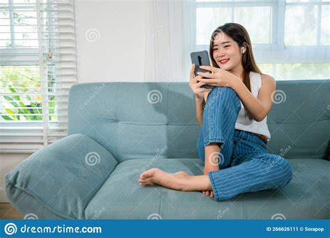 Happy Beautiful Female Relax And Shopping Online With Smartphone Stock