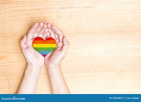 Human Hands Holding Heart With Rainbow Flag Stock Image Image Of Background Heart 145638917