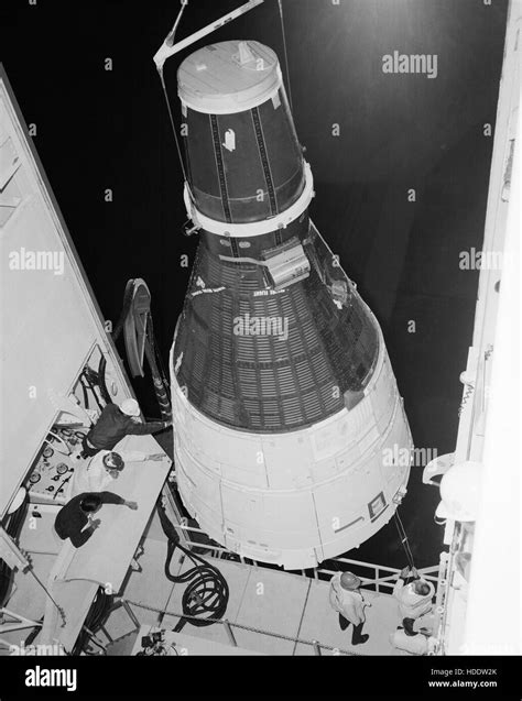 The Nasa Gemini 3 Spacecraft Is Hoisted Above The Titan Launch Vehicle