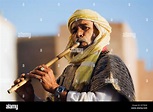 Street musician playing flute hi-res stock photography and images - Alamy