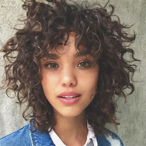 25 Photos That Will Make You Want Curly Bangs Haircuts