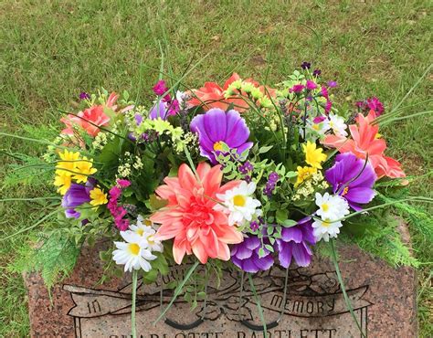 At koch & co, we have a wide range of artificial flowers and greenery available. Silk flower arrangement. Cemetery saddle arrangement ...