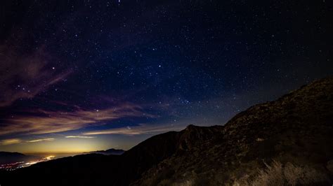 Download Wallpaper 1366x768 Starry Sky Mountains Stars Night Tablet