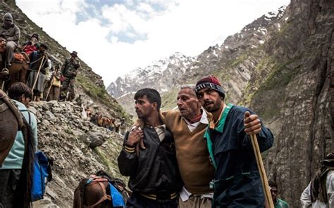 Thousands Of Hindus Make A Pilgrimage To Amarnath Cave In The Himalayas