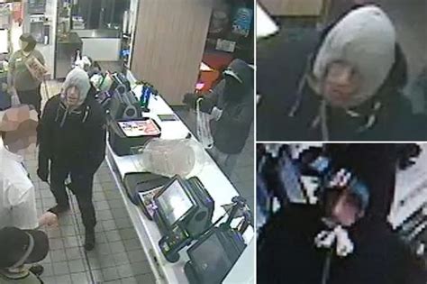 caught on camera shocking moment mcdonald s armed robbers threatened staff with hammer mirror