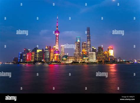 This Photo Taken From The Promenade On The Bund In Puxi Shows A Night