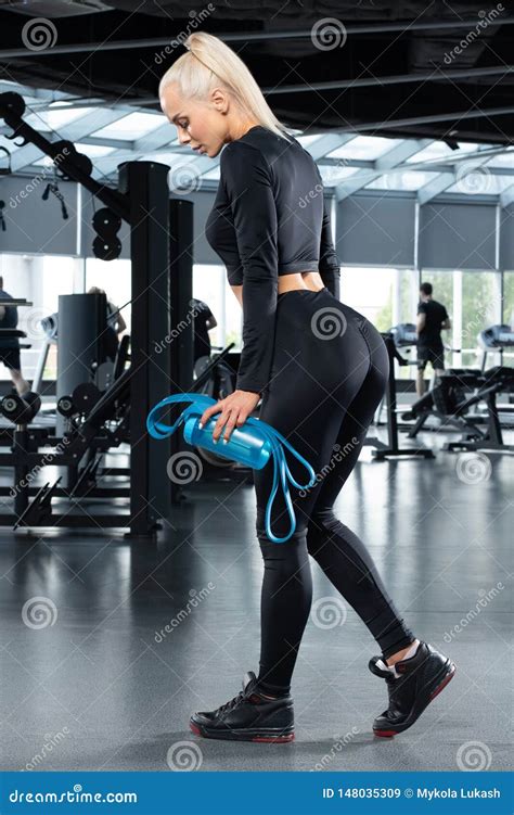 Fitness Woman Workout At The Gym Beautiful Athletic Girl With Shaker Of Water Stock Image