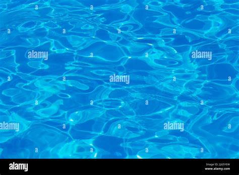 Swimming Pool Water Surface With Sparkling Light Reflections Aqua