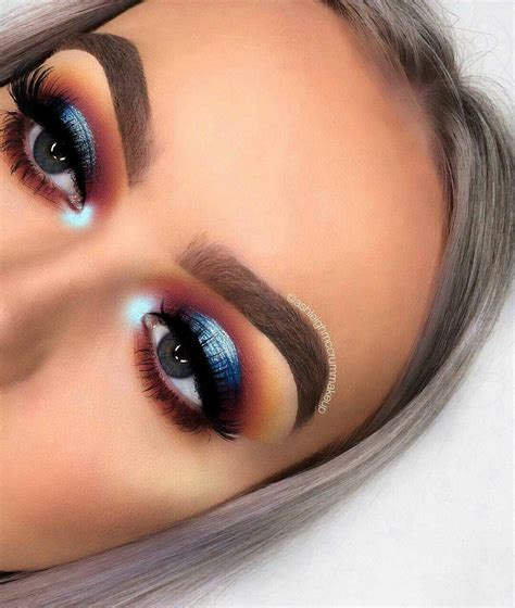 Makeup Looks Dramatic Eyeshadow Blue And Orange Halo Eye Glam Cut