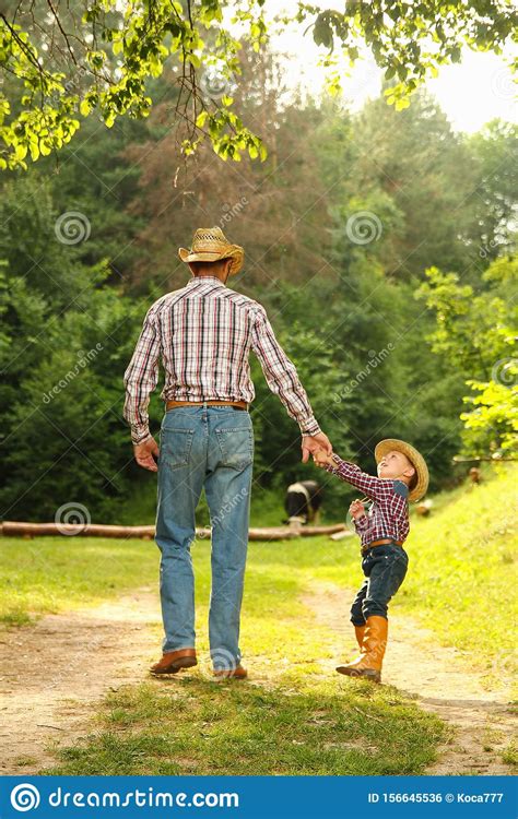 Father And Son Of A Cowboy Stock Photo Image Of Little 156645536