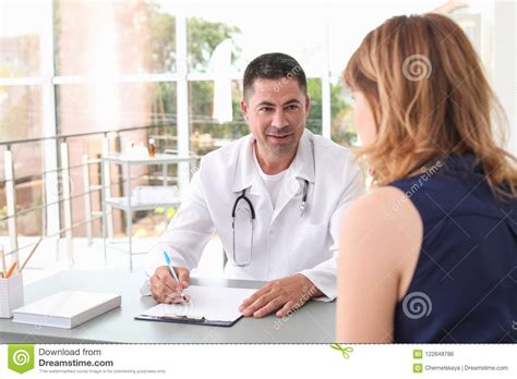 Patient Having Appointment With Doctor Stock Photo - Image of having, expertise: 122648786