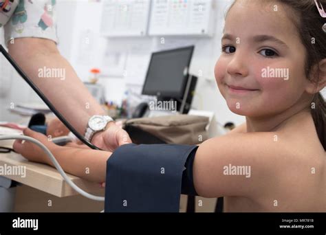 Blood Pressure Test Doctor Hi Res Stock Photography And Images Alamy