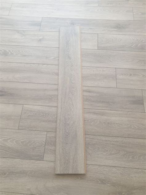 Quick Step Aquanto Light Grey Oak Effect Laminate Flooring Enviromate
