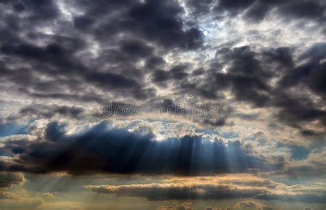 Sun Above The Clouds And Sunbeams Coming Down Stock Photo Image Of