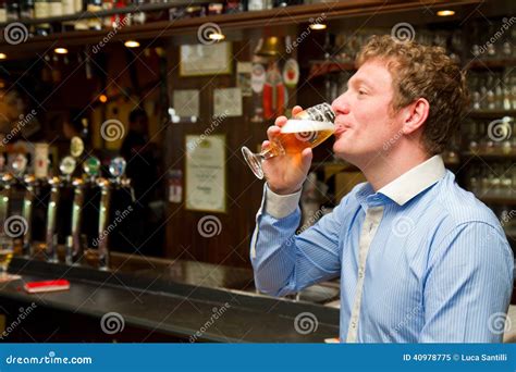 Portrait Of Men Drinking Beer At The Pub Stock Image Image Of