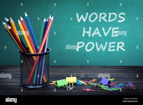 Words Have Power Text On Green Board And Group Of Pencils Stock Photo