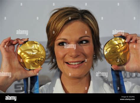 Maria Riesch Of Germany Poses With Her Two Gold Medals For The Womens