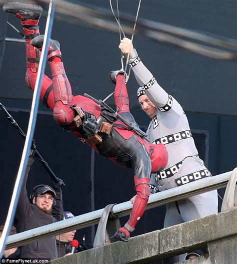 Ryan Reynolds Posts Bloody Deadpool Image See Deadpool Fight Colossus