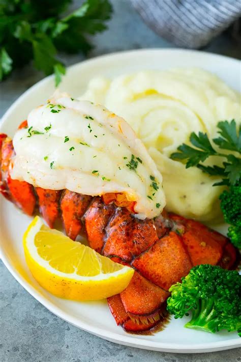 A Lobster Tail Served With Mashed Potatoes And Broccoli Easy Lobster