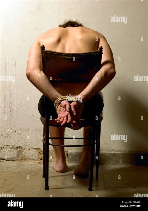 Tortured Man With Tied Hands Color Vertical Image Stock Photo Alamy