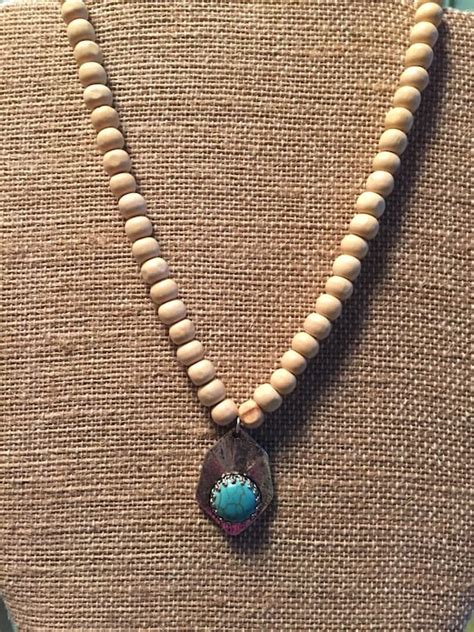 Items Similar To Wood Bead Necklace With Charm On Etsy