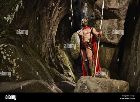 Victorious Greek Warrior On Rock Stock Photo Alamy