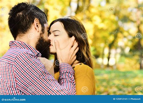 Girl And Bearded Guy Or Happy Lovers On Date Kiss Stock Image Image Of Leaves Outdoor 125912141