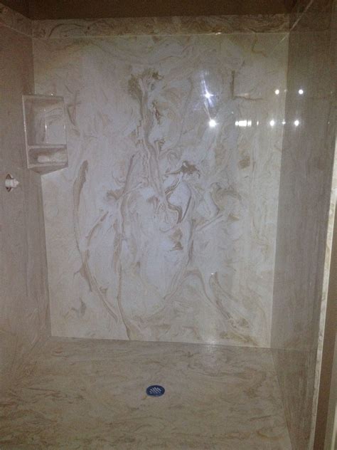 Bob helps install cultured marble panels in a bathroom. Cultured marble shower color is Mexican Sand | Cultured marble shower, Marble showers, Cultured ...