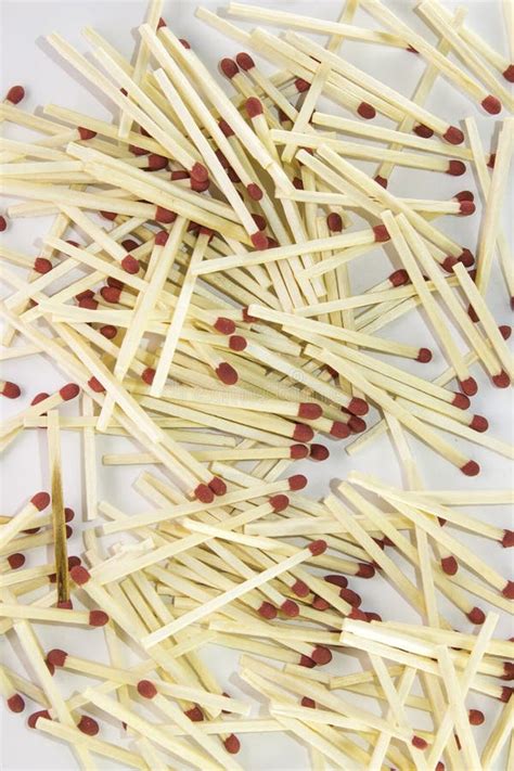 Row Of Wooden Matches With Red Heads On White Background Stock Photo