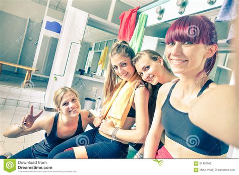 Happy Girlfriends Group Taking Selfie In Gym Dressing Room Stock Image