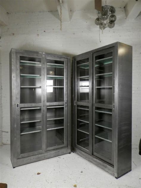 Single Industrial Metal Cabinet W Sliding Glass Doors At 1stdibs Glass And Metal Cabinet